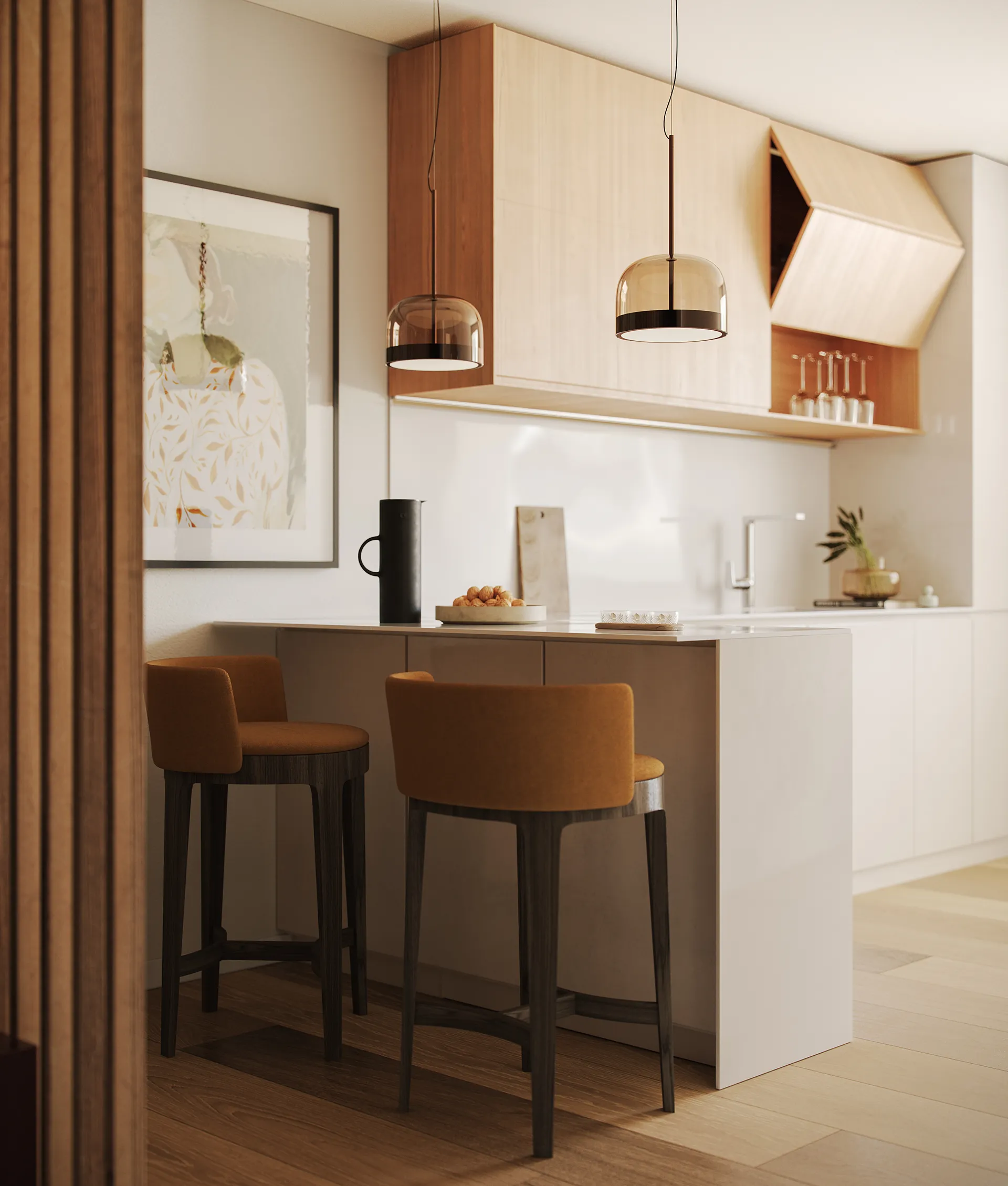 Cucina moderna con isola bianca, due sgabelli marroni, pensili chiari e due lampade a sospensione in vetro fumé.